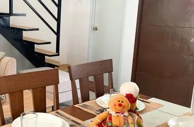 Gallery image 2 (1200x1600) — dining table beneath the stair